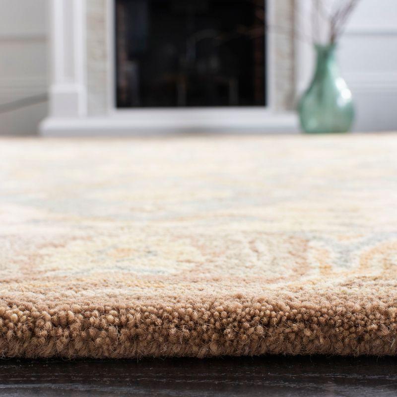 Handmade Teal and Camel Floral Wool Area Rug