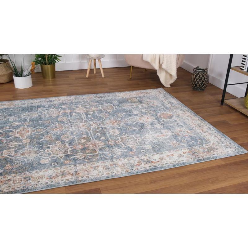 Light Blue Abstract 5' x 7' Stain-Resistant Area Rug