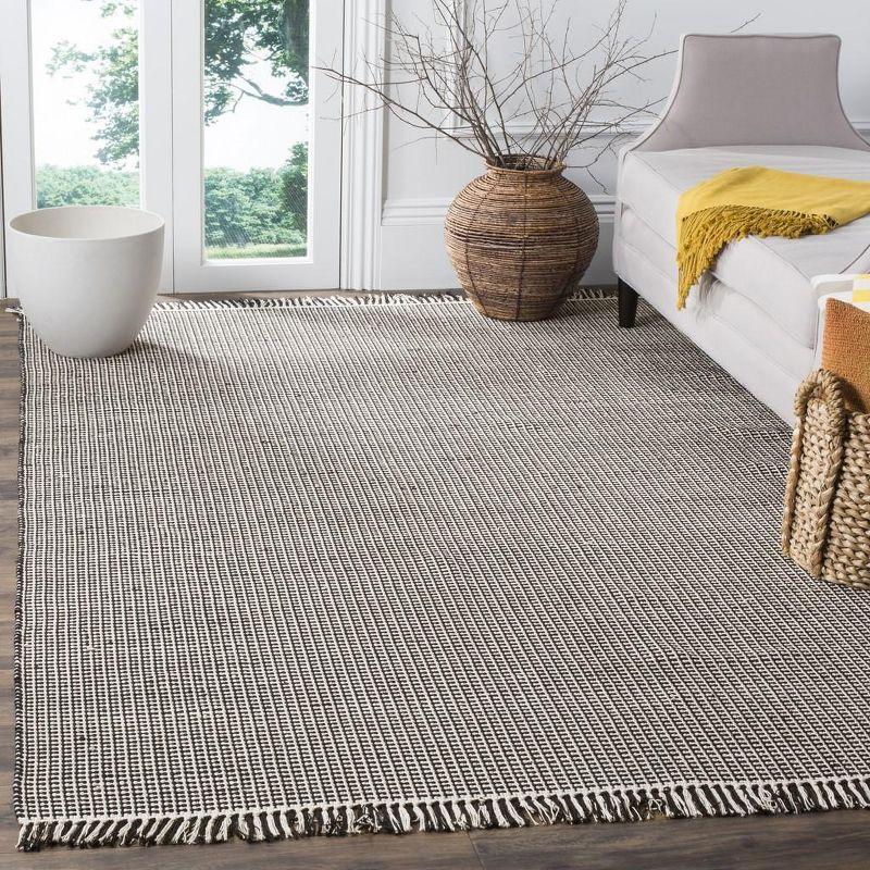 Montauk MTK340 Hand Woven Indoor Area Rug - Ivory/Black - 5'x8' - Safavieh