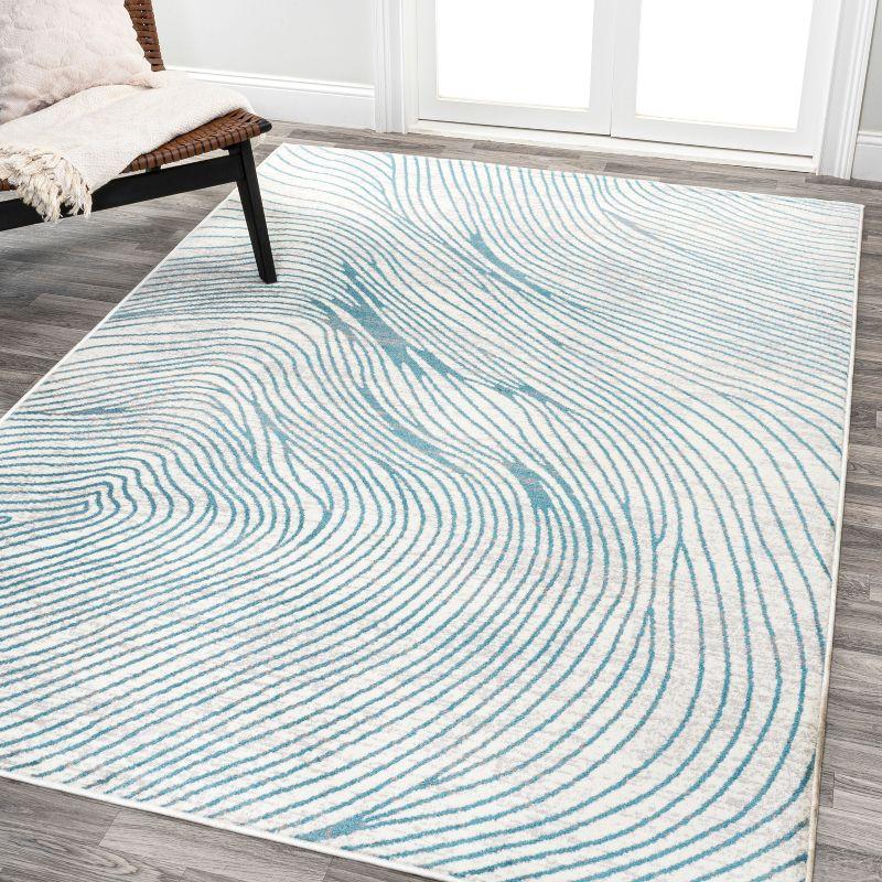 Ivory and Blue Geometric Synthetic 5x8 Area Rug