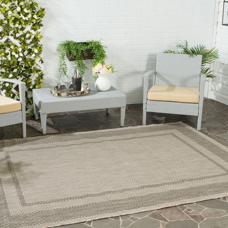 Beige and Black Rectangular Synthetic Outdoor Area Rug