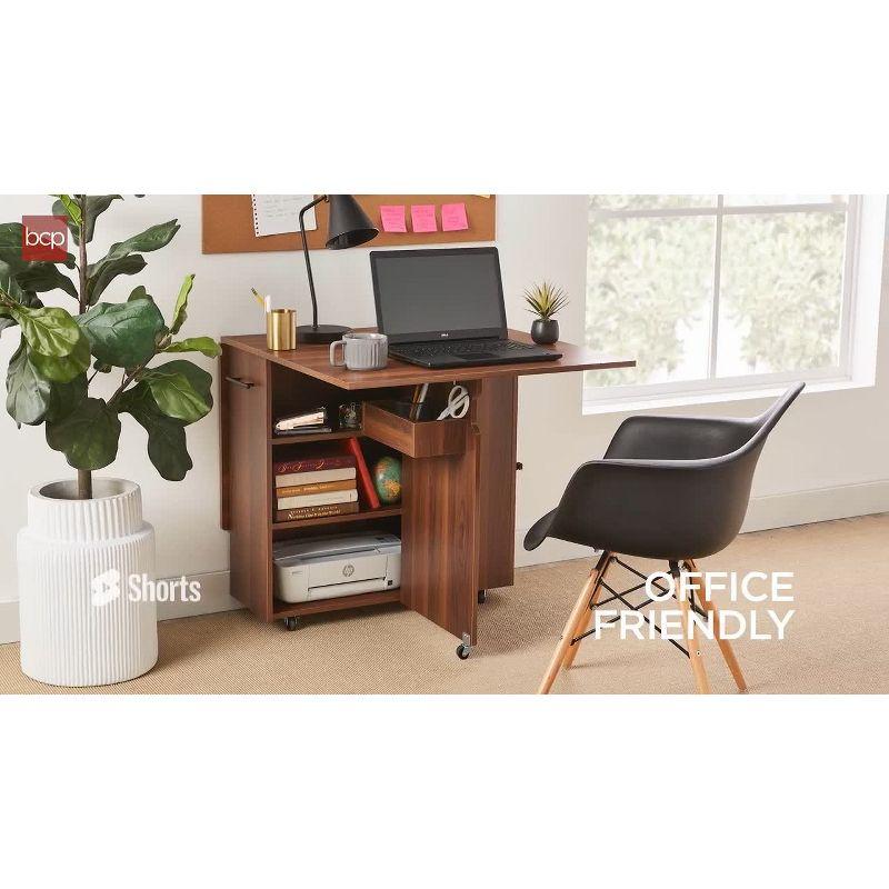 Best Choice Products Multipurpose Folding Table w/ Wheels, 3 Storage Shelves, Cubby, Handle - White