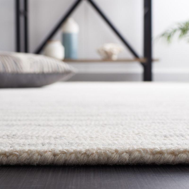 Abstract ABT926 Handmade Indoor Area Rug - Ivory/Light Blue - 4'x6' - Safavieh