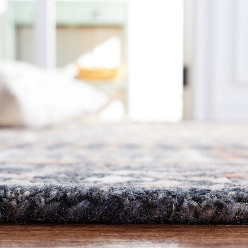 Aspen APN130 Hand Tufted Area Rug  - Black/Rust - 5'x5' - Safavieh.