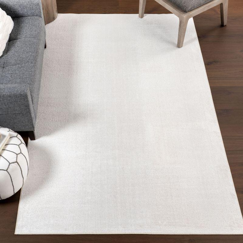 Cream Solid Machine Washable Synthetic Area Rug 5' 3" x 8'