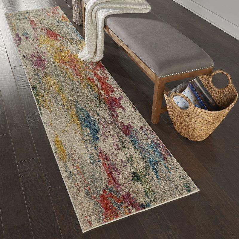 Ivory and Multicolor Abstract Tufted Synthetic Area Rug