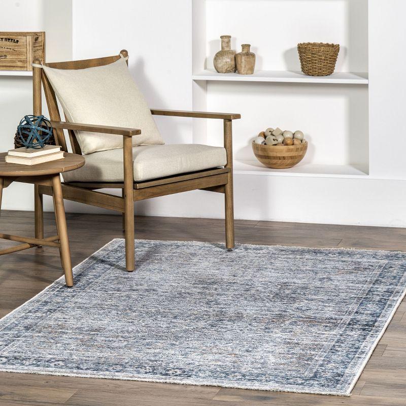 Light Blue 5' x 7' Washable Synthetic Area Rug