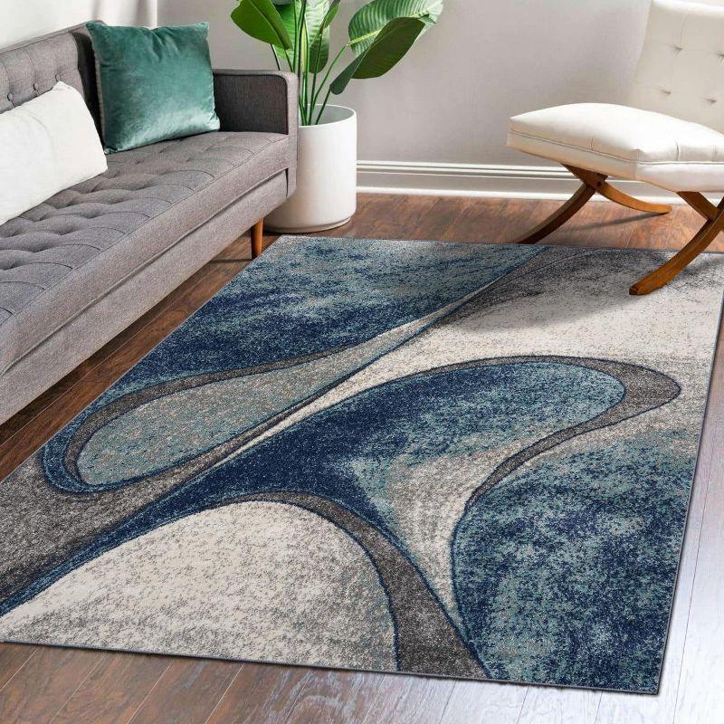 Abstract Swirls 8' x 10' Blue Synthetic Area Rug