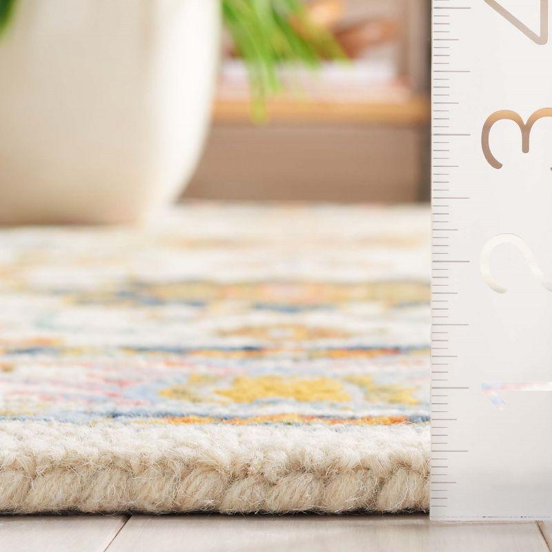Aspen APN109 Handmade Tufted Area Rug - Ivory/Blue - 6' X 9' - Safavieh