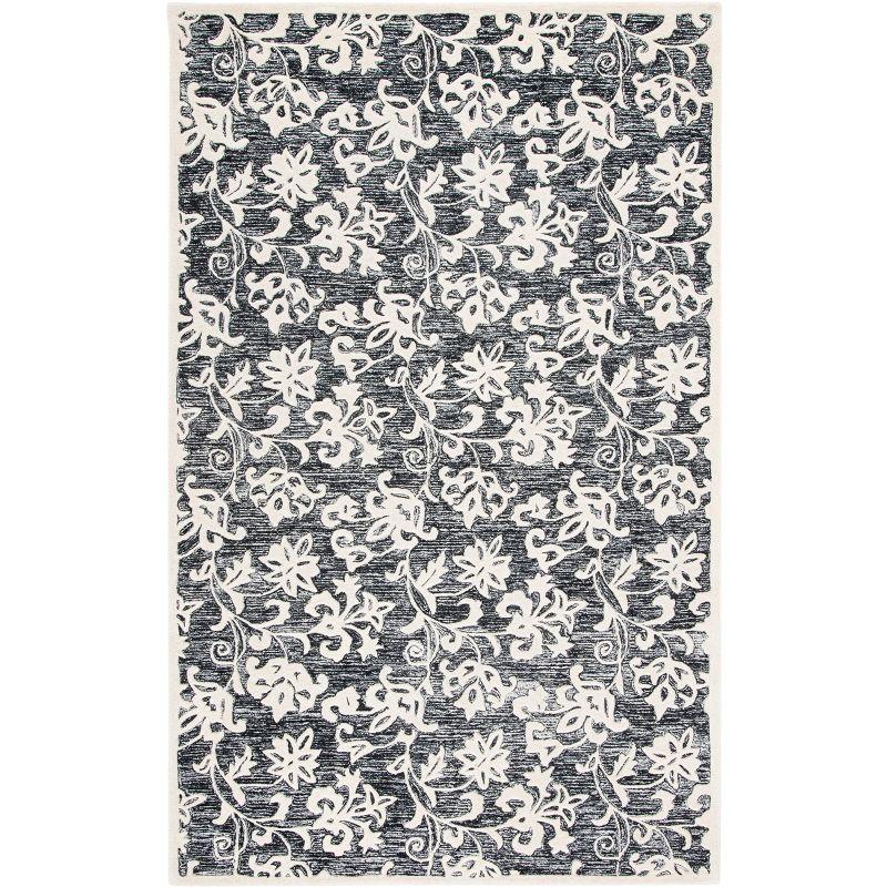 Metro MET853 Hand Tufted Indoor Area Rug - Black/Ivory - 4'x6' - Safavieh