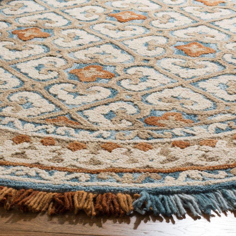 Blossom BLM420 Hand Tufted Area Rug - Ivory/Blue - 6' Round - Safavieh.