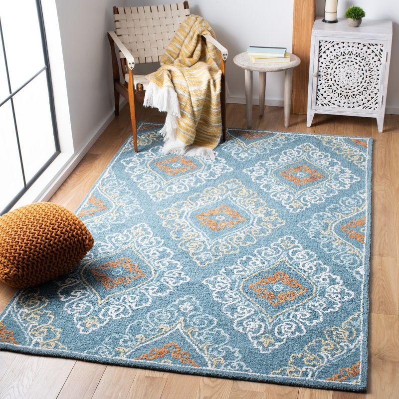 Blossom BLM606 Hand Tufted Area Rug - Blue/Yellow - 4'x6' - Safavieh.