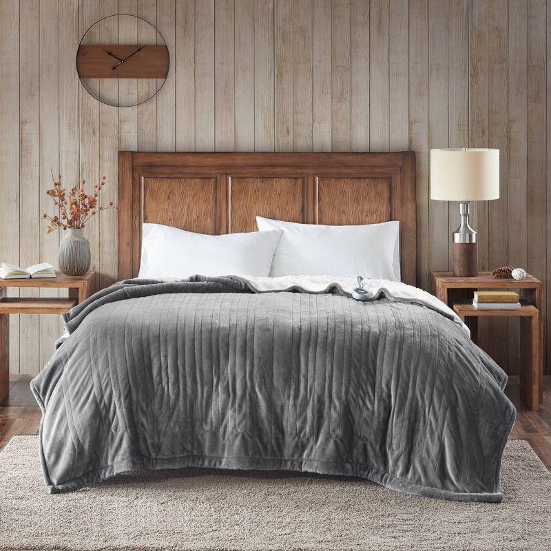 Woolrich Heated Plush to Berber Blanket