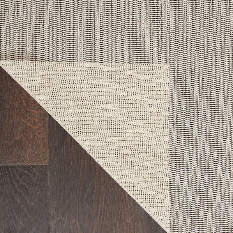 Ebern Designs Rectangle Shiftloc Solid Color Machine Made Polyester/Plastic/Acrylic Area Rug in Ivory