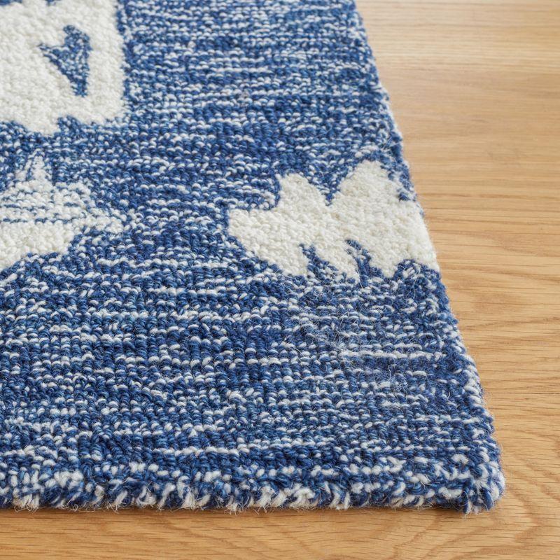 Handmade Bohemian Blue and Ivory Wool Area Rug 8' x 10'