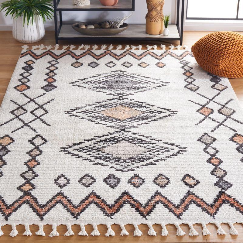 Ivory Moroccan Tassel 54'' Rectangular Synthetic Area Rug