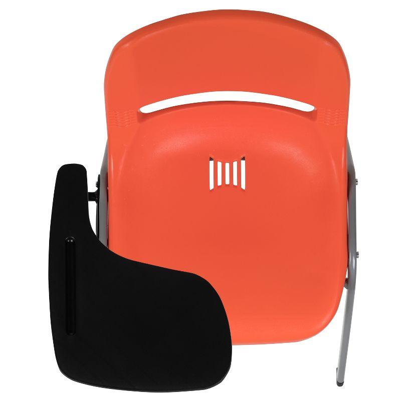 Compact Orange Ergonomic Shell Chair with Flip-Up Tablet Arm