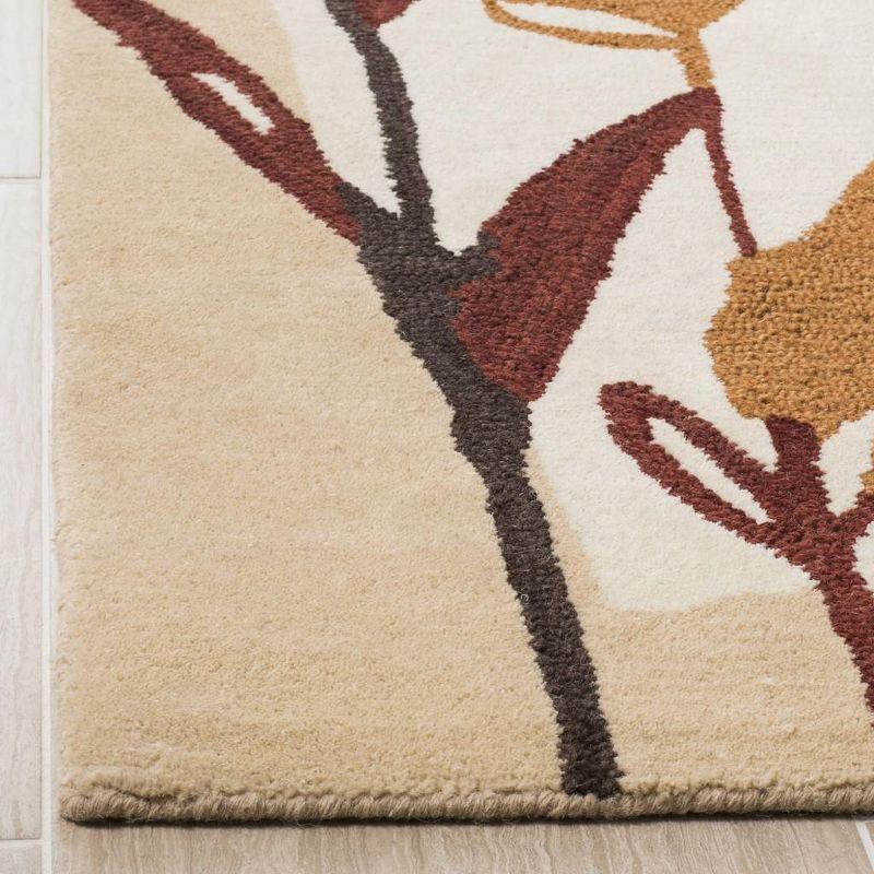 Ivory and Multicolor Floral Hand-Tufted Wool Area Rug, 4' x 6'