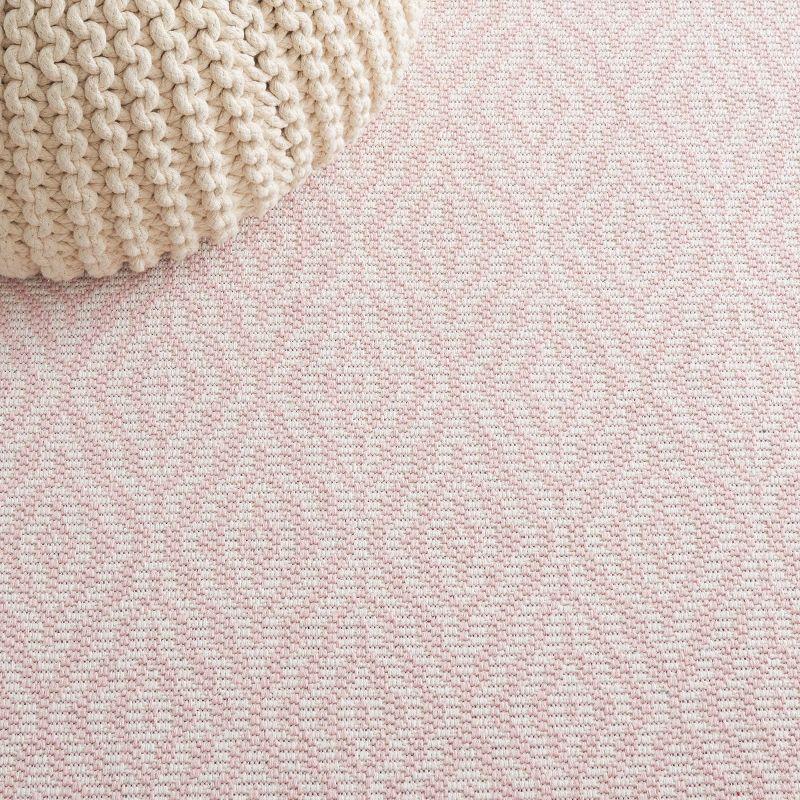 Handmade Pink and Ivory Wool 5' x 7' Reversible Braided Rug