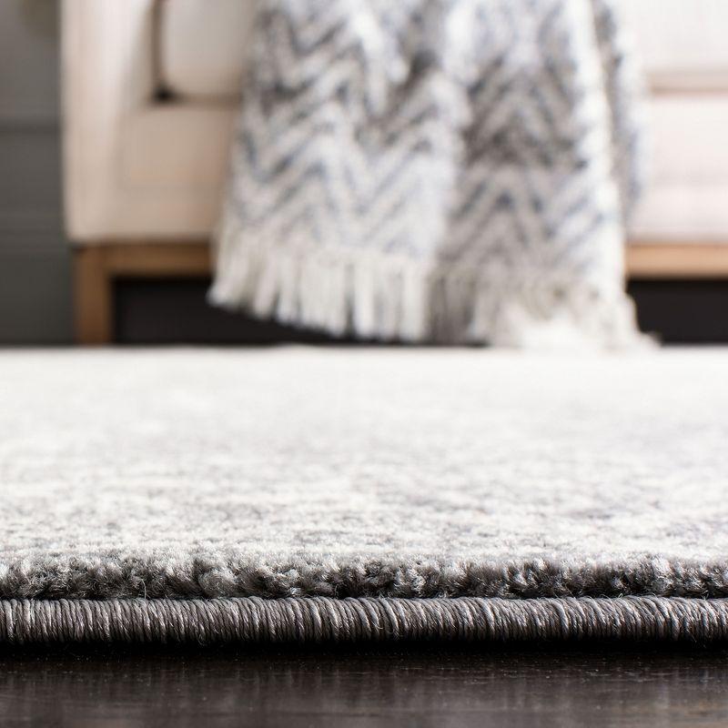Evoke EVK270 Power Loomed Area Rug Grey / Ivory 5'-3" X 7'-6" - Safavieh.