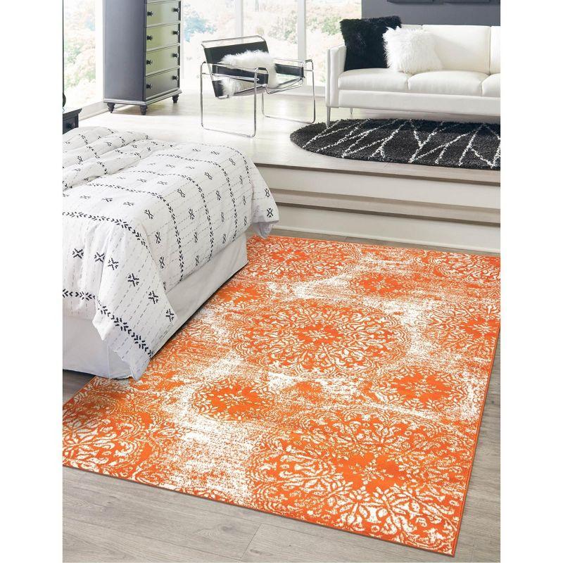 Orange and Ivory Synthetic Low Pile Bohemian Area Rug