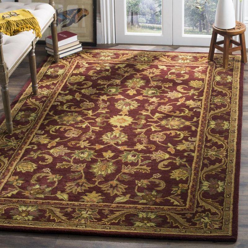 Antiquity AT52 Hand Tufted Indoor Area Rug - Wine/Gold - 8'3"x11' - Safavieh