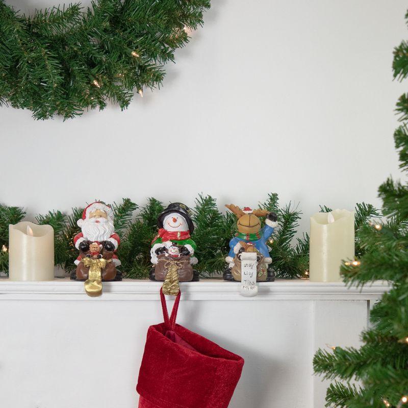 Festive Santa, Snowman, and Reindeer Christmas Stocking Holders Set