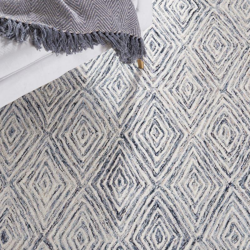 Capri CPR217 Hand Tufted Area Rug - Ivory/Blue - 8'x10' - Safavieh.