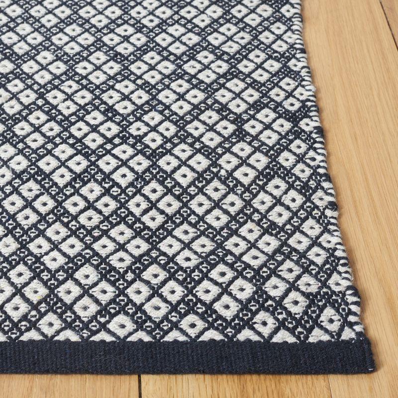 Kilim KLM703 Hand Woven Area Rug - Black/Ivory - 8'x10' - Safavieh.