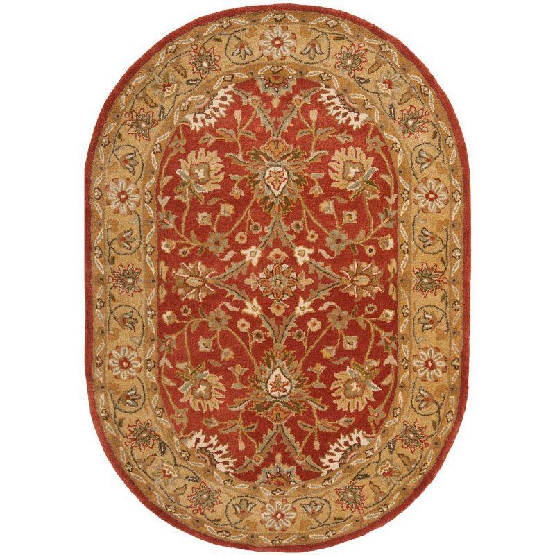 Handmade Rust and Gold Wool Oval Area Rug