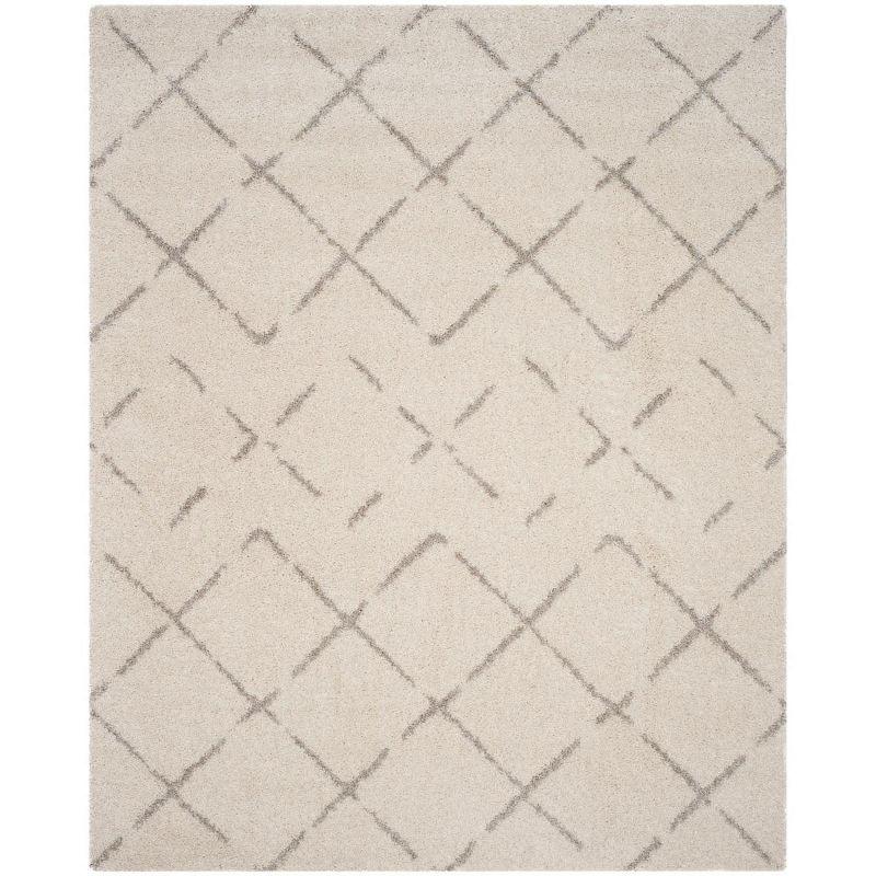 Ivory and Beige Geometric Shag 8' x 10' Area Rug