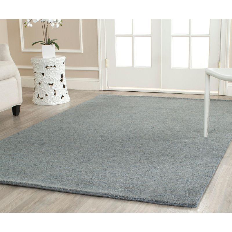 Himalaya HIM311 Hand Loomed Area Rug - Blue - 5'x8' - Safavieh.