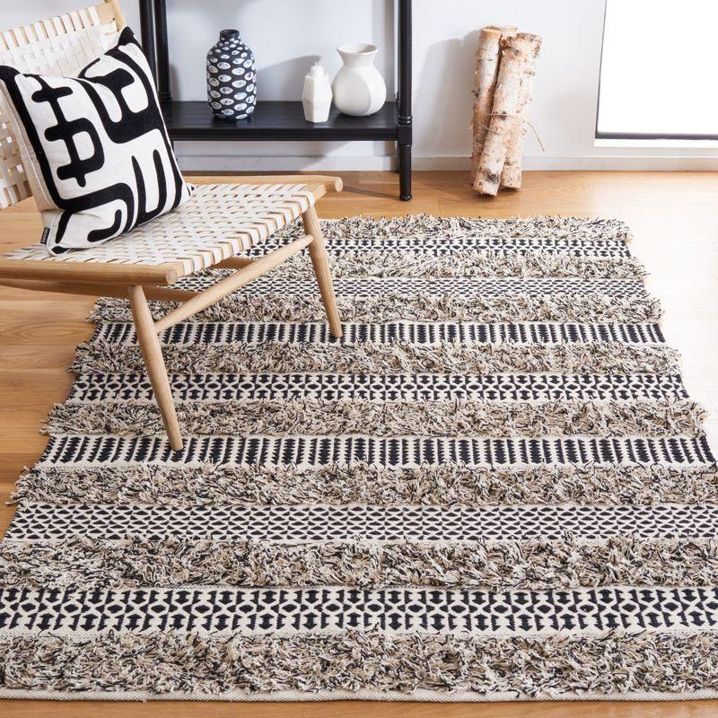 Handmade Black and Ivory Cotton Flat Woven Rectangular Rug