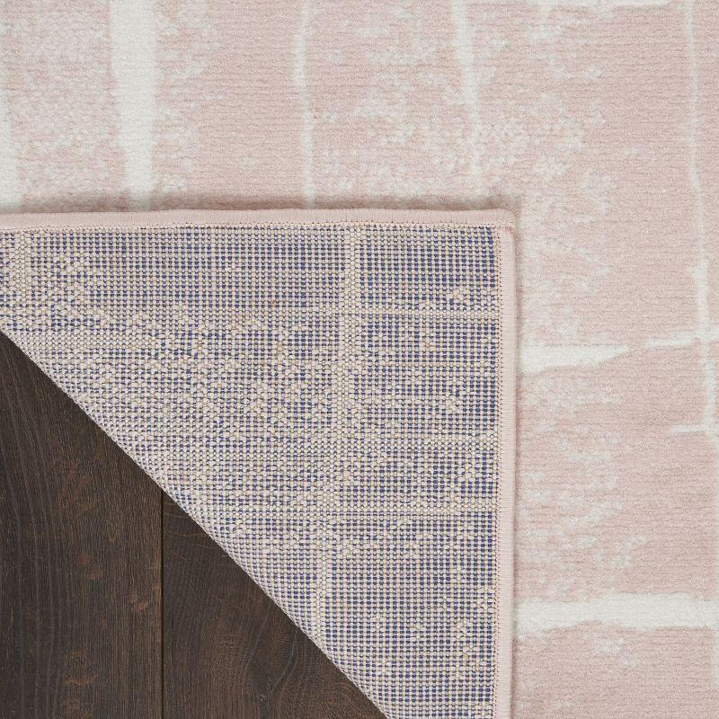 Ivory and Pink Abstract Synthetic 6' x 9' Area Rug