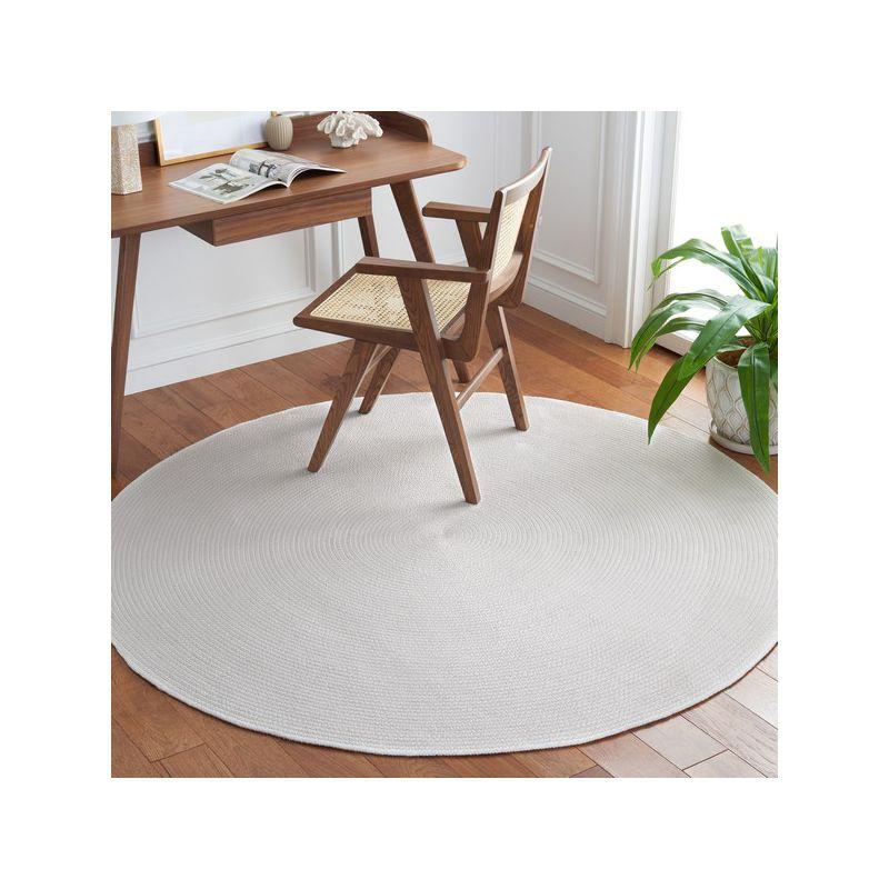 Braided BRD403 Hand Woven Area Rug - White - 4' round - Safavieh.