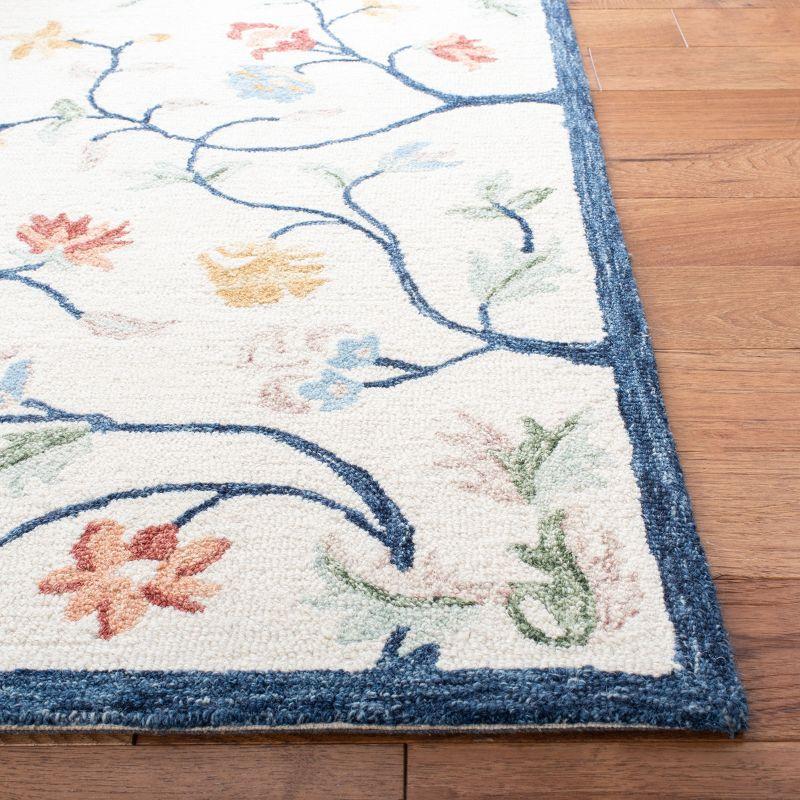 Metro MET120 Hand Tufted Area Rug - Ivory/Blue - 8'x10' - Safavieh.