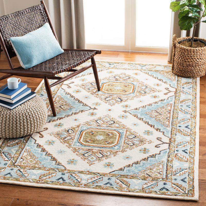 Capri CPR209 Hand Tufted Area Rug - Ivory/Rust - 4'x6' - Safavieh.