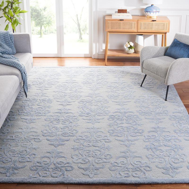 Handmade Bella Blue Wool 9' x 12' Tufted Rectangular Area Rug