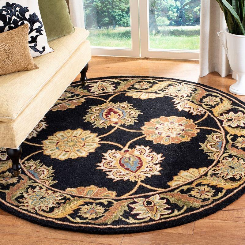 Elegant Heritage 8' Round Black Hand-Tufted Wool Rug