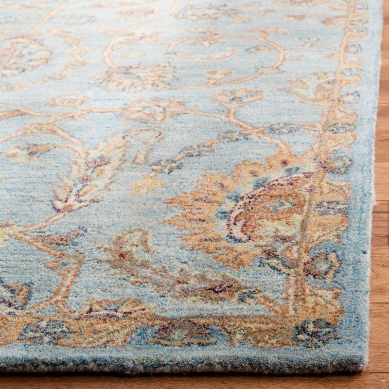 Elegant Heritage Hand-Tufted Light Blue Wool Rectangular Rug