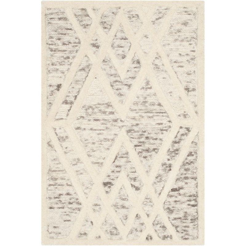 Cambridge CAM729 Hand Tufted Area Rug  - Safavieh