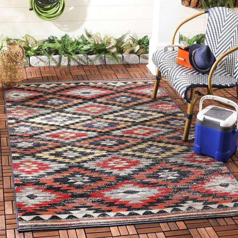 Rust Red Geometric Synthetic Reversible Area Rug