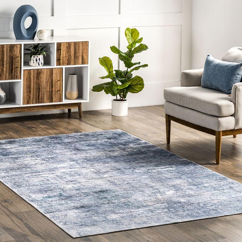 Sustainably-Sourced Blue Abstract 5' x 8' Washable Area Rug