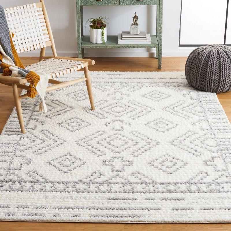 Ivory and Grey Hand-Knotted Round Synthetic Area Rug