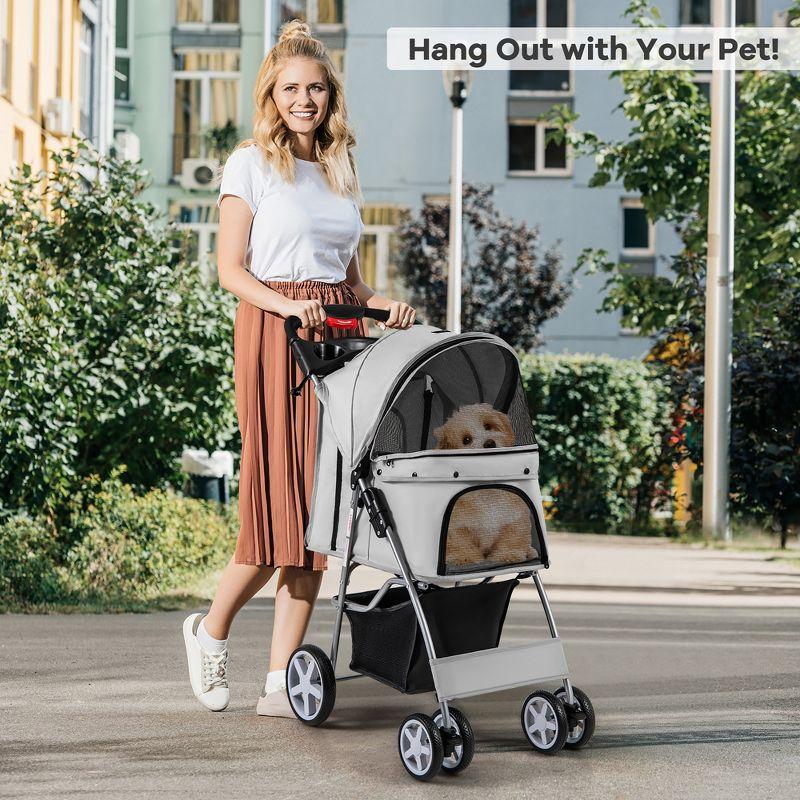 Gray Folding Pet Stroller with Mesh Windows and Storage Basket