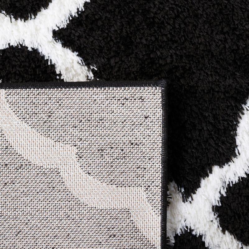 Tahoe Shag THO675 Power Loomed Area Rug - Black/White - 6'7"x8'7" - Safavieh.