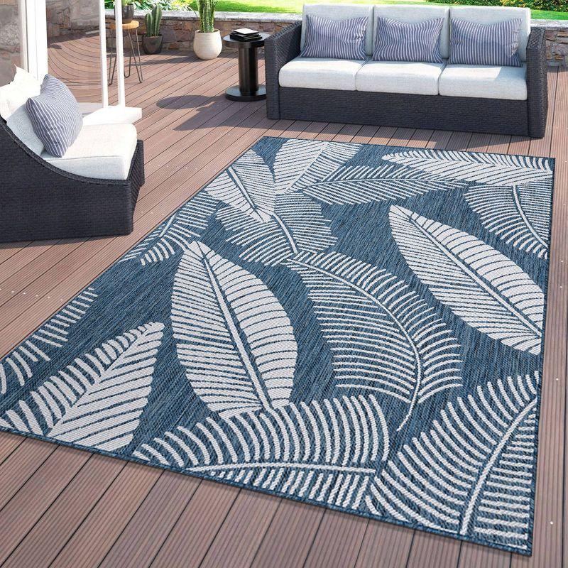 Navy Floral Synthetic 7'10"x10' Flat Woven Indoor/Outdoor Rug