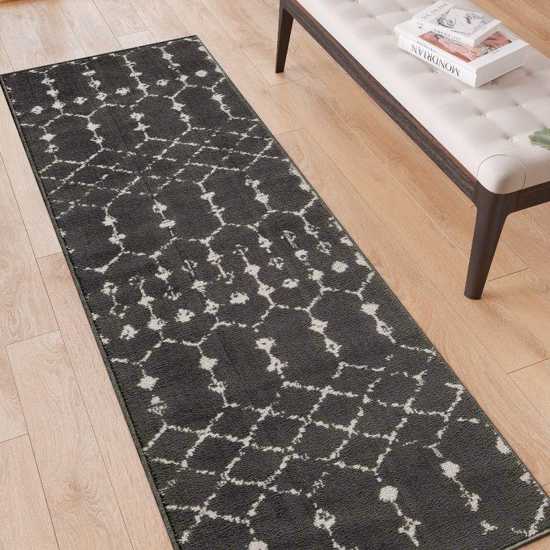 Dark Gray and Ivory Geometric Bohemian Low Pile Rug, 2' x 6'