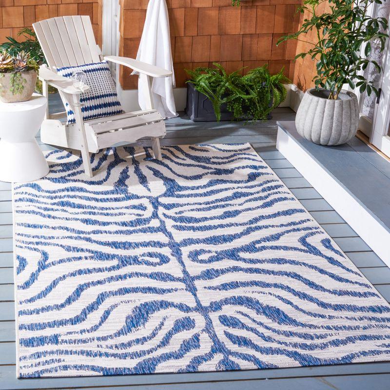 Ivory and Navy Animal Print Indoor/Outdoor Rug