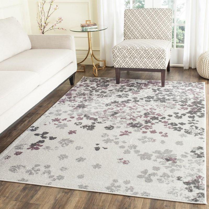 Ivory & Purple Floral Synthetic 5' x 7' Reversible Area Rug